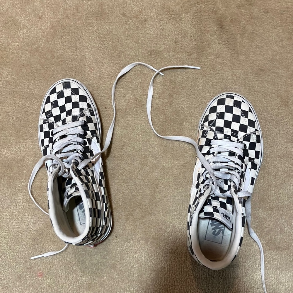 VANS checkered high top shoes.